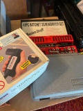 Lot of assorted tools, ratchet, screwdriver set, slot machine, hinge, sliding tool, Dremel, and