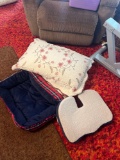 Pillows, dog bed, and chair cushion