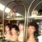 Arched glass shelf unit