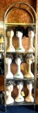 Arched glass shelf unit