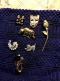 7- brooches