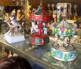 Shelf of music carousels and knickknacks