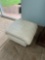 cream colored foot stool -pool room