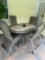 patio table with four chairs outside