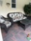 Patio sofa chair and table outside