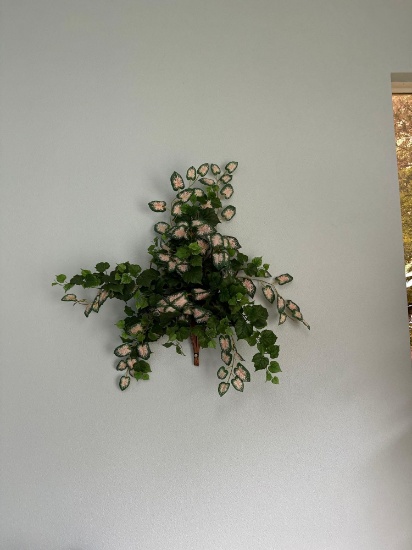 2 artificial plants on wall - pool room