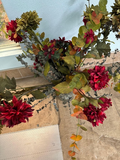 11 in glass vase with artificial flowers in pool room