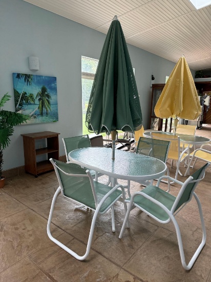 Patio table, 4 chairs, and umbrella. Like new condition - pool room