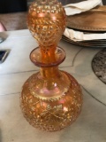 9 inch gold carnival glass decanter/lid needs repaired