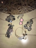 5- charm bracelets, Alex & Ani, Guess