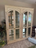2 matching china cabinets with glass shelves