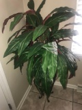 Artificial plant with stand