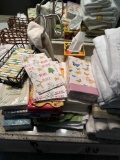 bathroom lot of towels and napkins