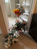 plant stand and artificial flower arrangements
