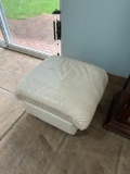 cream colored foot stool -pool room