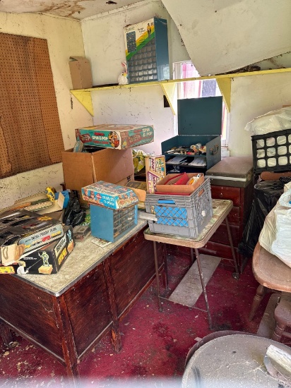 contents of shed in front of pole barn