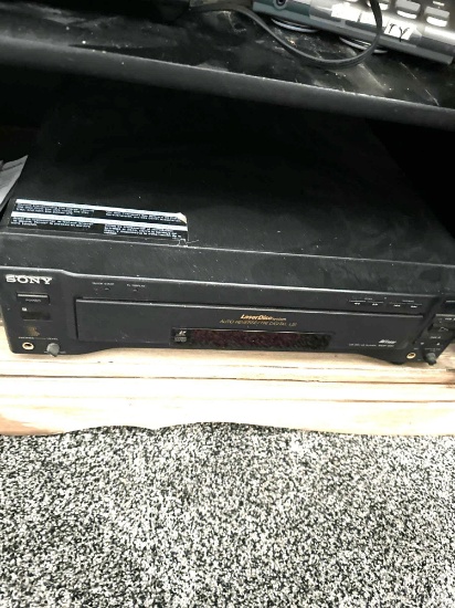 Cabinet with Sony laser disc system /rca dvd player