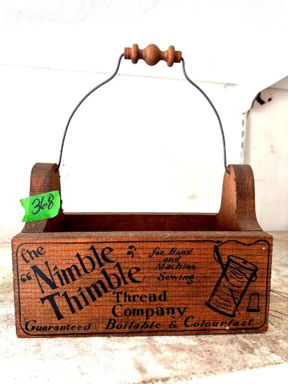 wooden nimble, thimble, thread company, carrier garage