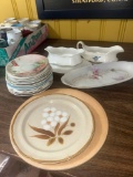 assorted saucers/dishes