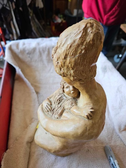 Twelve inch tall pottery figure