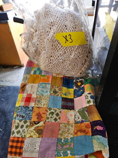 Assorted doily's and table cover