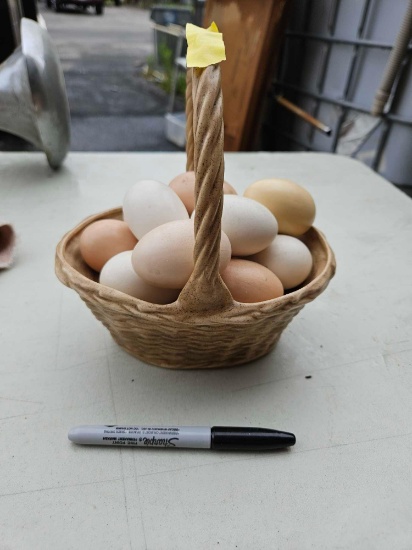 Basket of ceramic eggs