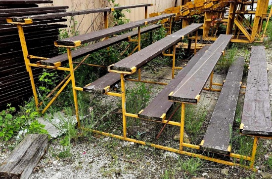 approximately 6 sections of bleacher seats 12 feet long