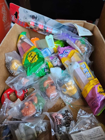 Assorted pez containers.and misc