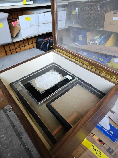 18 inch glass lidded case with picture frames