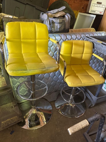 2- Yellow swivel adjustable height chairs