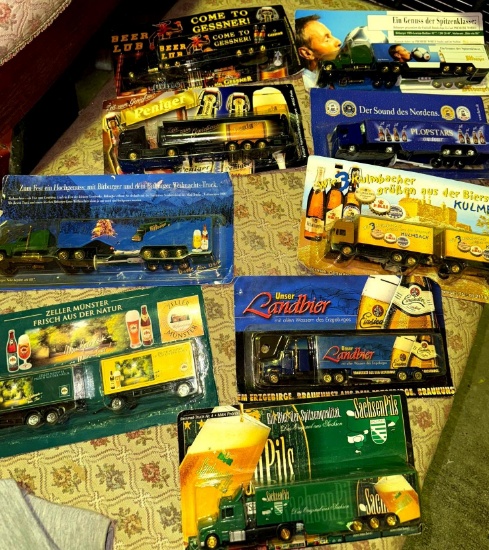 9- Beer advertisement toys on my trucks