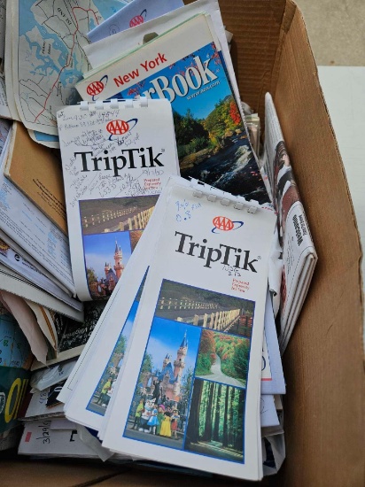 Box of aaa triptiks and tour books and road maps