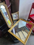 3 small framed mirrors