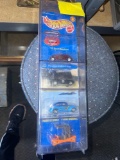 4- HotWheels vehicles in case