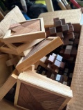Box of wooden puzzles