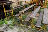 approximately 6 sections of bleacher seats 12 feet long