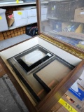 18 inch glass lidded case with picture frames