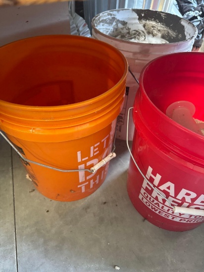 3- 5 gallon buckets one with cat litter to clean oil