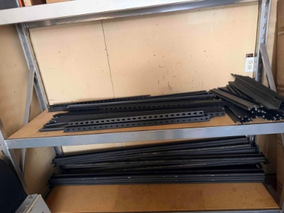 lot of metal shelving left rear of room