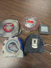 five miscellaneous tape measures used