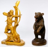 Carved Bear and Hunter Statues
