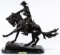 (After) Frederic Remington (American, 1861-1909) 'Cowboy' Bronze Statue