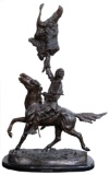 (After) Frederic Remington (American, 1861-1909) 'The Buffalo Signal' Bronze Statue