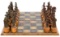 Charles Pratt (American, b.1937) 'Cowboys and Indians' Copper Alloy Chess Set