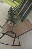 LOT OF SIX PATIO CHAIRS ON FRONT PORCH