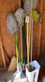 LOT OF MOPS AND BROOMS