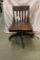 VINTAGE WOODEN DESK CHAIR ON WHEELS