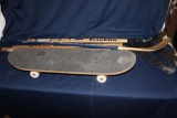 LOT WITH HOCKEY STICKS, SKATEBOARD