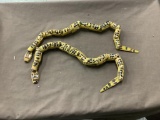 2 wooden snakes