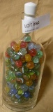 GLASS JAR FULL OF ASSORTED MARBLES